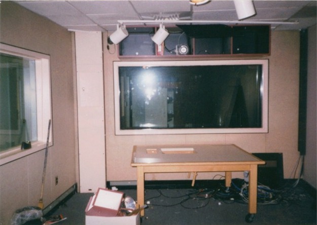 The  WROR (98.5) Production studio looking into the WROR news booth
